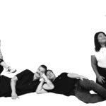 A group shot of the Unify team with 5 people in it. They are all acting silly.